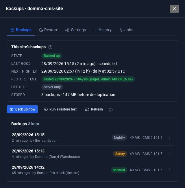 Domma's side of the same site: backed up, last good backup, next nightly run, test restore passed, and the three backups kept