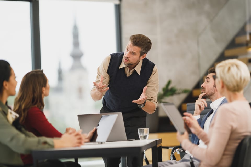 A small team planning round a table