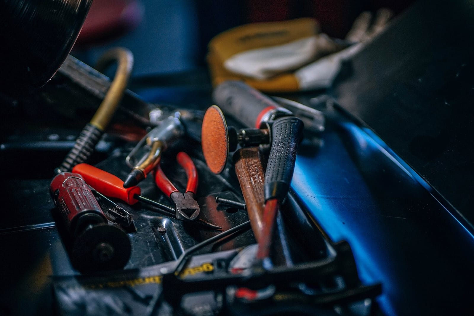 Tools in a box on a workshop floor